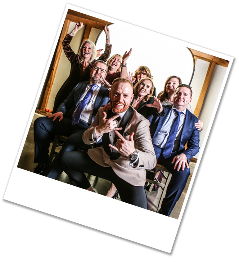 Family having photo taken in open plan photo booth